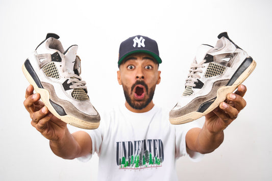 Before restoration Air Jordan 4 Black Military with visible dirt and oxidation