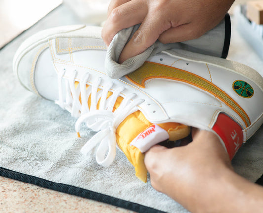 A close up shot of cleaning the Nike Blazer in the Raygun colorway. 