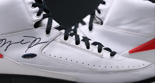 A pair of Chicago Air Jordan 2s from 1994 signed by Michael Jordan.