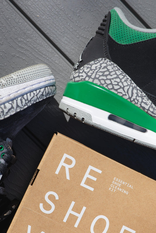 The Air Jordan 3 Pine Green next to the Reshoevn8r Signature Shoe Cleaning Kit. 